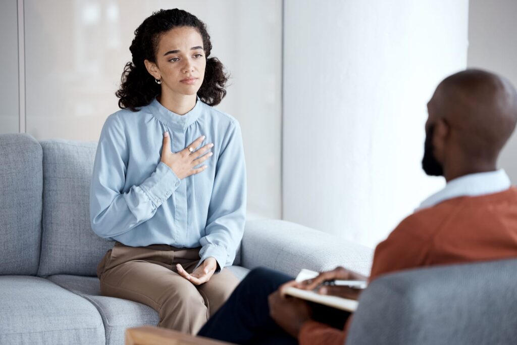woman with a psychologist for therapy, trauma and mental health support